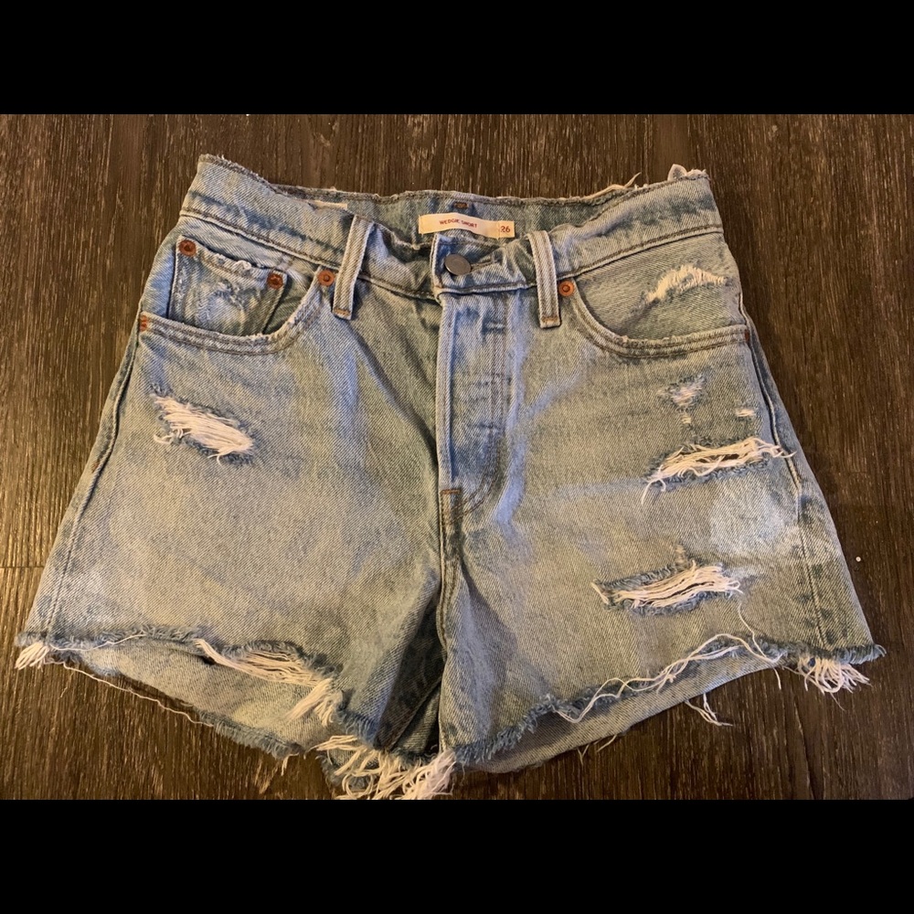 Levi’s 501 wedgie distressed denim shorts